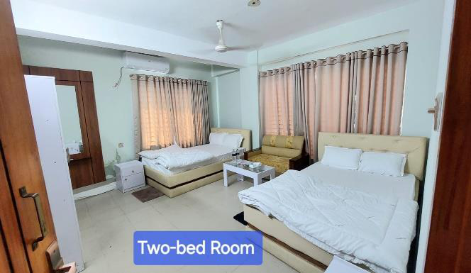 Two-bed room preview at Hotel Sahara Safe Home